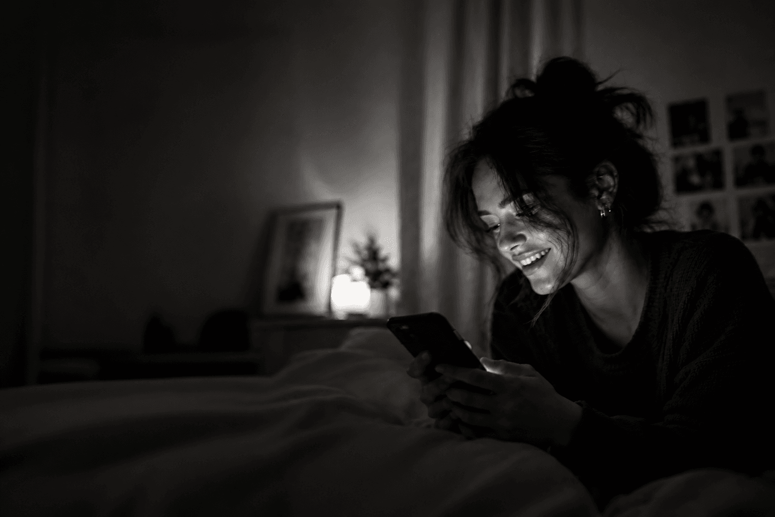 A customer using her phone at night